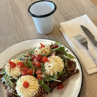 Garden Goddess personal pizza with pepperoni added.