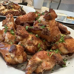 Those wings- 'git 'em! Comes with 2 dipping sauces