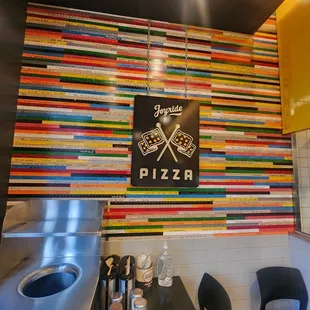 Love this wall with yard sticks!