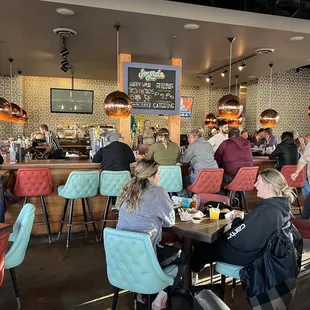 people sitting at the bar