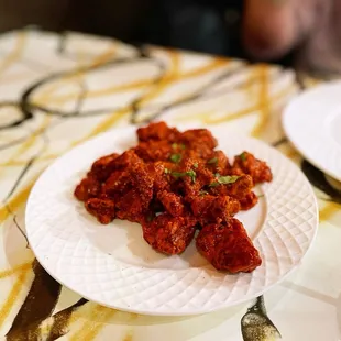 a plate of fried chicken