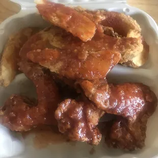 chicken wings in a styrofoam container