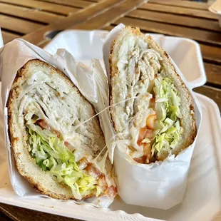 a sandwich in a styrofoam container