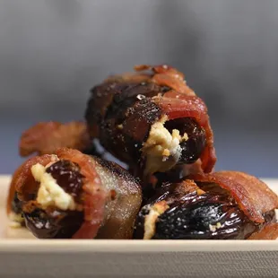 Bacon wrapped dates stuffed with goat cheese