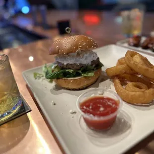 Lamb burger with onion rings