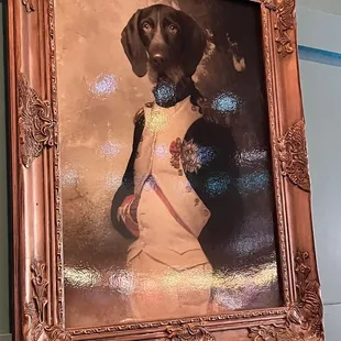 Dog paintings line the wall