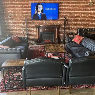Comfy fireplace seating by front door