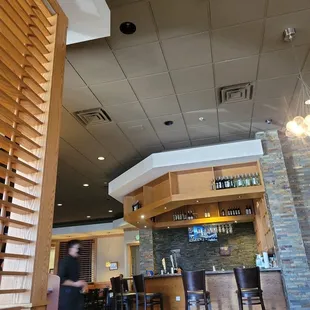 a man walking through a restaurant