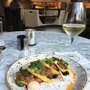 Ahi tuna nachos with Kim Crawford Sauvignon blanc.