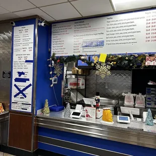 a counter with a menu on it