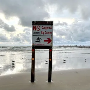No swimming near the jetty; surfing okay.