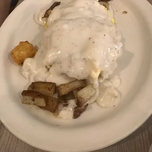 Gravy with biscuits and eggs.