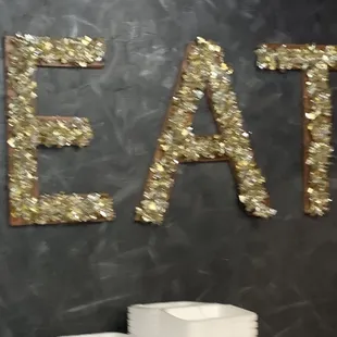 Sign behind counter.