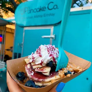 dark chocolate chip pancakes, blueberries, blueberry sauce, banana, &amp; peanut butter