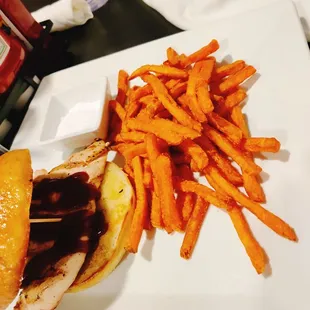a plate with a sandwich and french fries