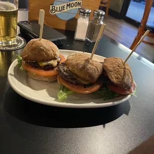 Angus happy hour sliders with spicy aïoli.