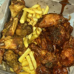 Lemon pepper wet (left); fries; dirty bird (right)