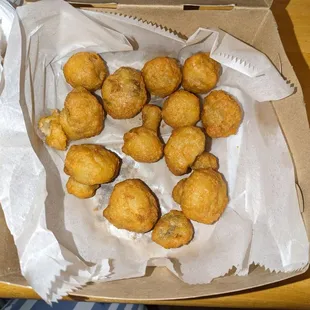 Our what seems to be half eaten fried mushrooms box