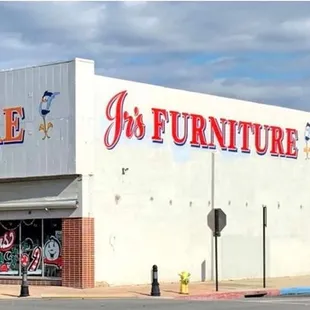 Outside of Jr&apos;s Furniture across from Omni Health!
