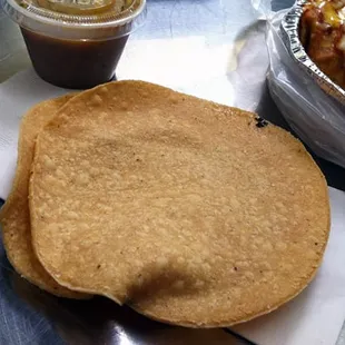 full fried tortilla rounds with salsa