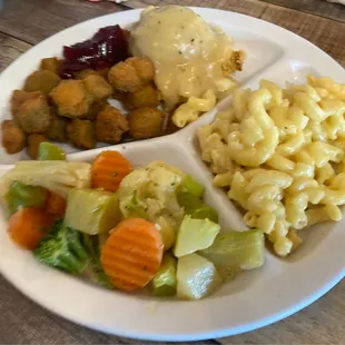 Chicken and dressing w/ fried okra, mac and cheese and mixed vegetables