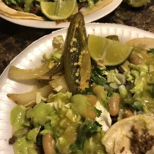 Add your own toppings, asada and cabeza tacos!! Supreme tacos are the best!