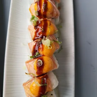 ROULETTE ROLL - torched salmon, crab, avocado, fried shishito peppers, spicy mayo, eel sauce