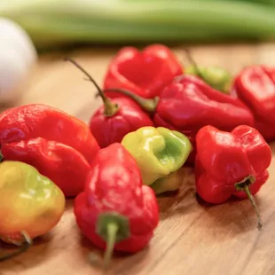 a bunch of peppers on a table