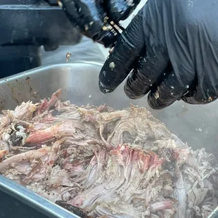 a person wearing gloves and gloves