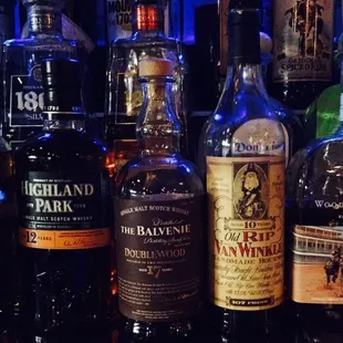 a variety of liquor bottles