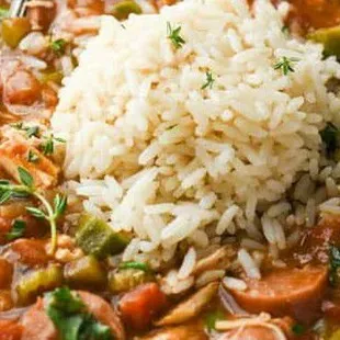 a bowl of gumbo with rice