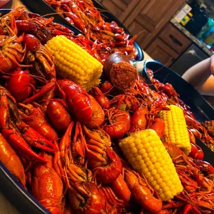 a platter of craws and corn