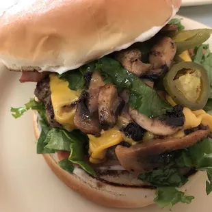 The cheeseburger with bacon jalapeños n grilled mushrooms added