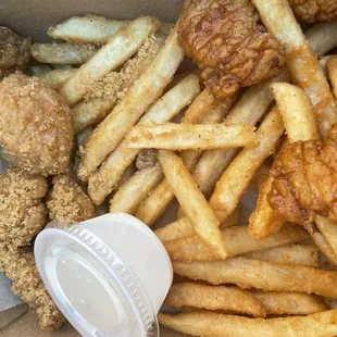 Ben&apos;s order of Boneless Wings with 2 Flavors. Left: Creole Rub, Right: Honey Heat.