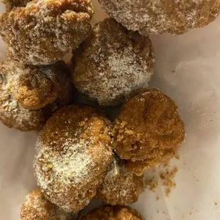 a pile of fried donuts