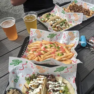 Beer battered cod, beer battered shrimp, honey wasabi salmon, fries with cheese, and fries with chorizo (beer from Narrow Path Brewing Co.)