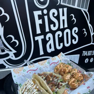Left to right... beer battered cod taco, honey wasabi salmon taco and half order of bang bang shrimp!!!