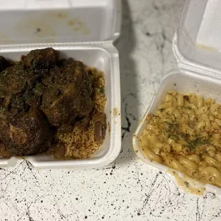 Jerk Oxtails with Dirty Rice and a side of Mac and Cheese
