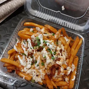 Cheesy fries with crab meat. We're creatures of habit. Find something we like and order repeatedly!