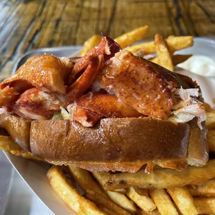 Lobster roll over a ton of fries!