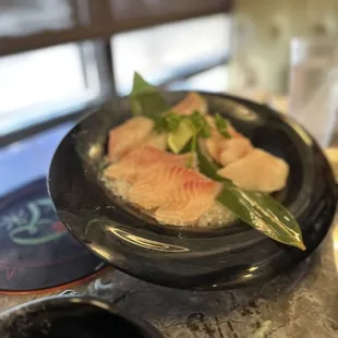 a plate of raw fish