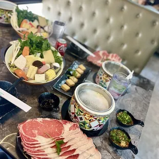 a variety of meats on a table