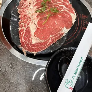 This is the ribeye steak slices that you cook with your soup.