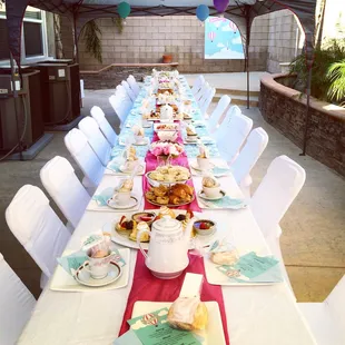 6ft tables and white folding chairs from J's. Decor and arrangements by me.