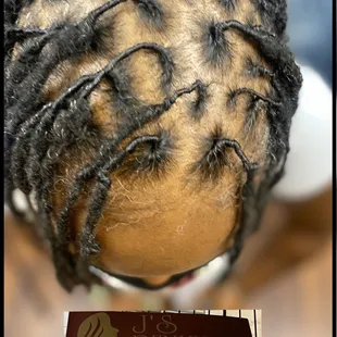 J&apos;S Remixed Real Dreads dressed and twisted.