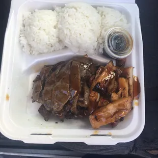 a meal in a styrofoam container