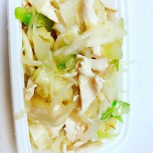 chicken and cabbage in a white container