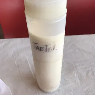 Dirty tartar sauce bottle