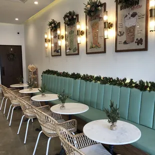 a row of chairs and tables in a restaurant