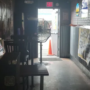 This hallway leads to the patio area where you can watch the game, eat, and drink.